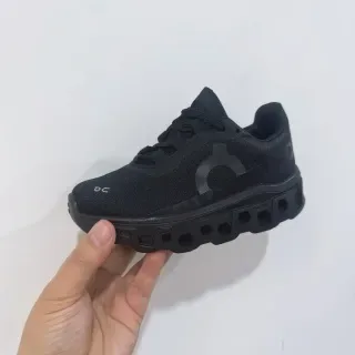 On Cloudmonster Off-White and Black Lifestyle Sneakers 5
