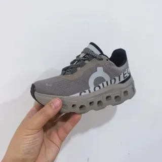 On Cloudmonster Off-White and Black Lifestyle Sneakers 8