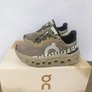 On Cloudmonster Off-White and Black Lifestyle Sneakers 18