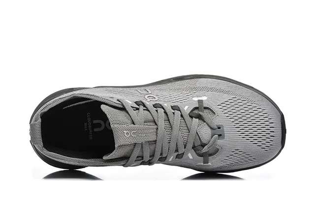 On Gris Negro Parte superior de tricot ingenieril Open Hexagonal CloudTec Pods Zapatos de running 3