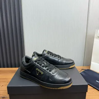 Prada Cloudbust काला सोना चमड़ी की ऊपरी छिद्रित टो कैप लाइफस्टाइल स्नीकर