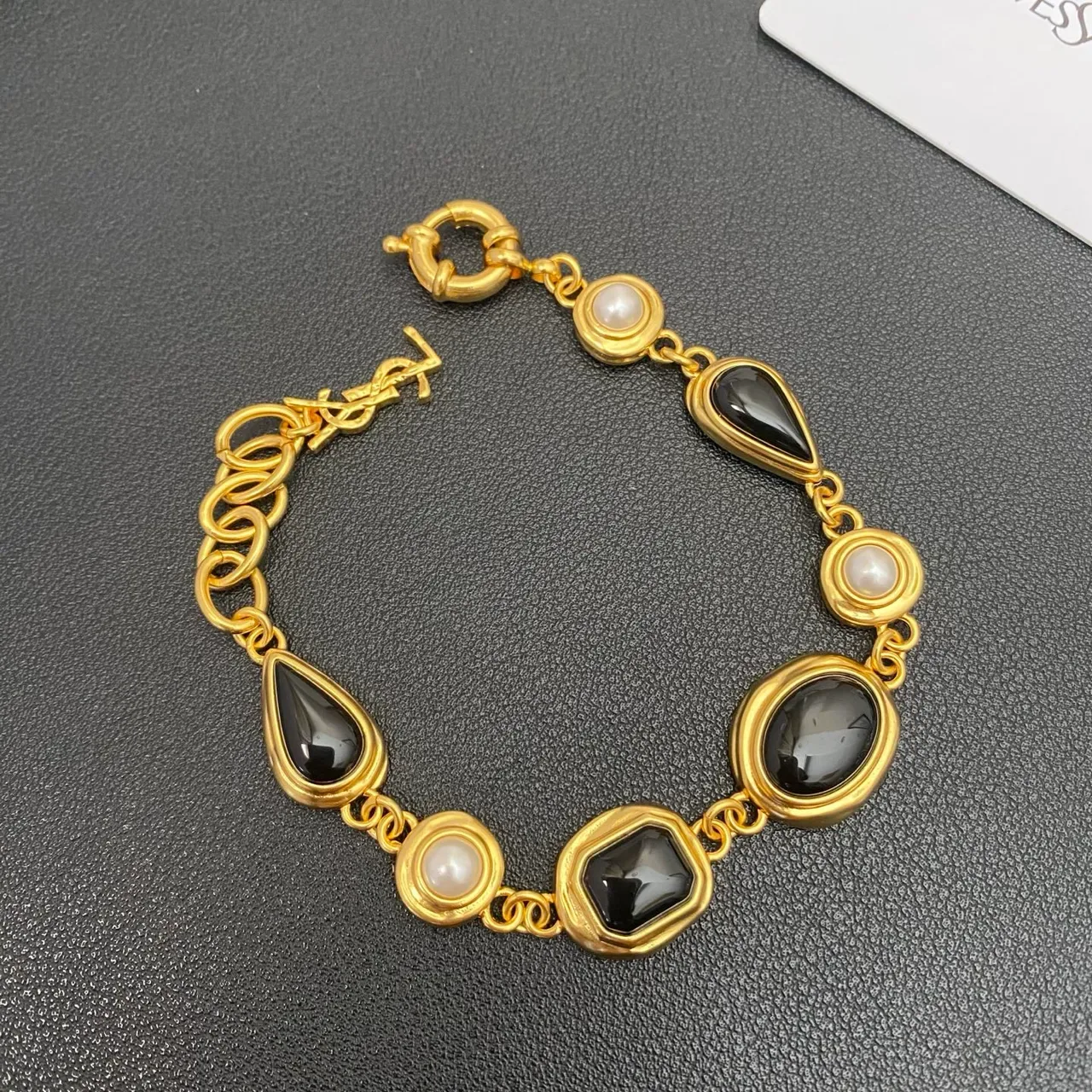 Saint Laurent Gold-Tone Black Stone and Pearl Link Bracelet 5