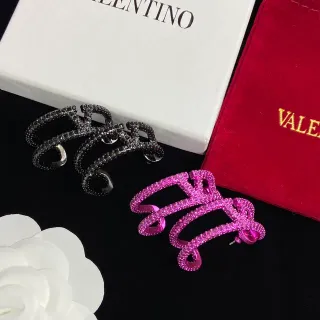 Valentino Pendientes rosa y negro en espiral de bucles múltiples Pavé incrustados con cristales