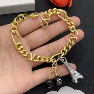 Valentino VLogo সোনা কালো Figaro Chain Motif ব্রেসলেট