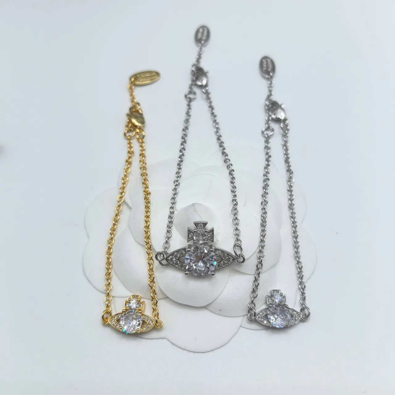 Vivienne Westwood Orb and Cross Crystal Bracelets 7
