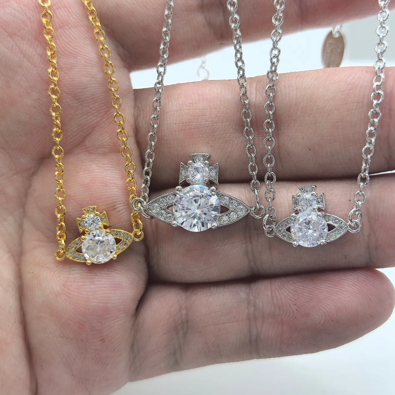Vivienne Westwood Orb and Cross Crystal Bracelets 8