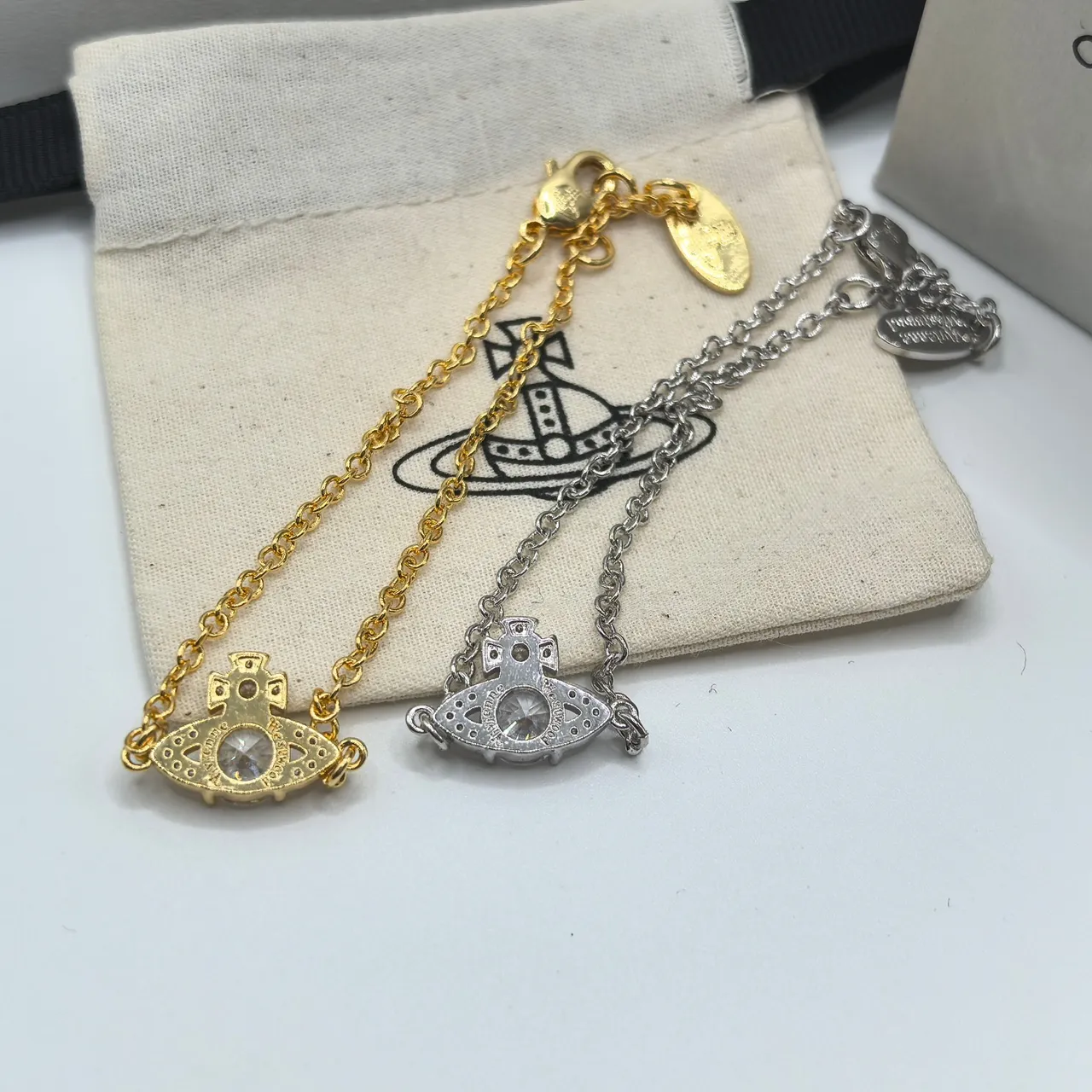 Vivienne Westwood Orb and Cross Crystal Bracelets 9