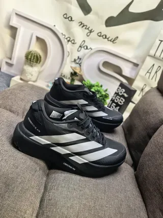Adidas Black and Silver Three-Stripe Lifestyle Sneakers 9