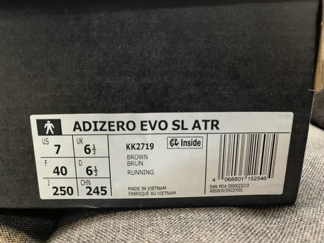 Adidas Black and Silver Three-Stripe Lifestyle Sneakers 12