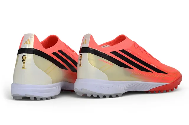 Adidas Zapatillas de fútbol rosa y naranja low-cut con upper sintético gradiente neón para césped artificial 15