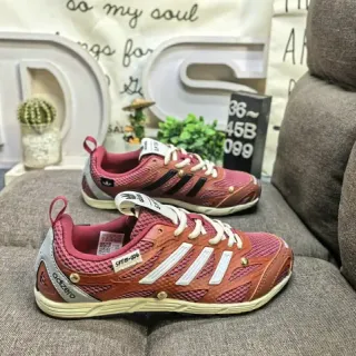 Adidas أحمر بني حذاء رياضي تنفسي شبكي في الأعلى ثلاث شرائط علامة جانبية نمط حياة