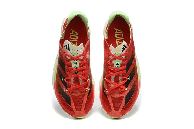 Adidas Chaussures de running rouge et vert avec upper en mesh engineered, panneau latéral à trois rayures 2