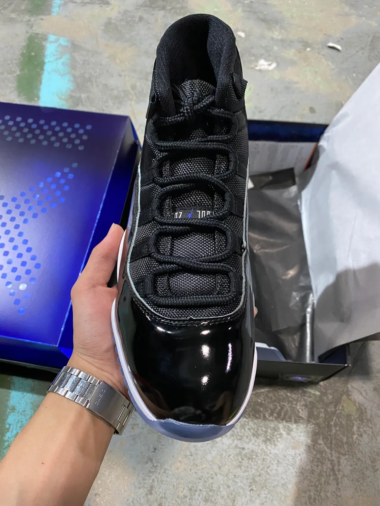 Tênis de basquete Air Jordan 11 preto brilhante branco azul gelo 3
