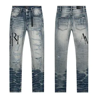 Amiri Distressed Slim Fit Embroidered Monogram Blue Jeans