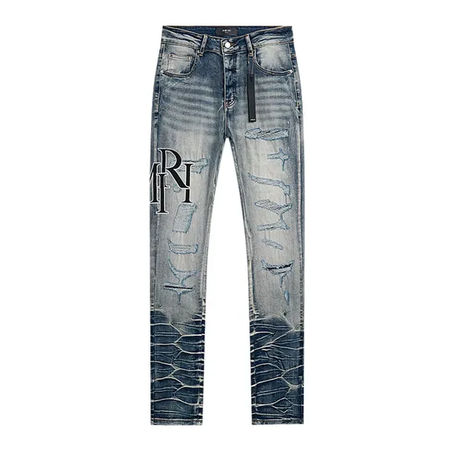 Amiri بنطلون جينز أزرق distressed slim fit مطرز مونوغرام 2