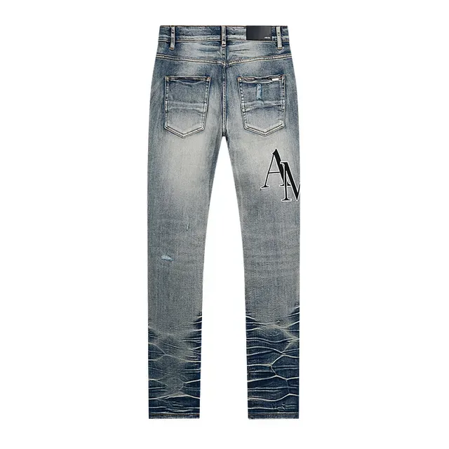 Amiri بنطلون جينز أزرق distressed slim fit مطرز مونوغرام 3