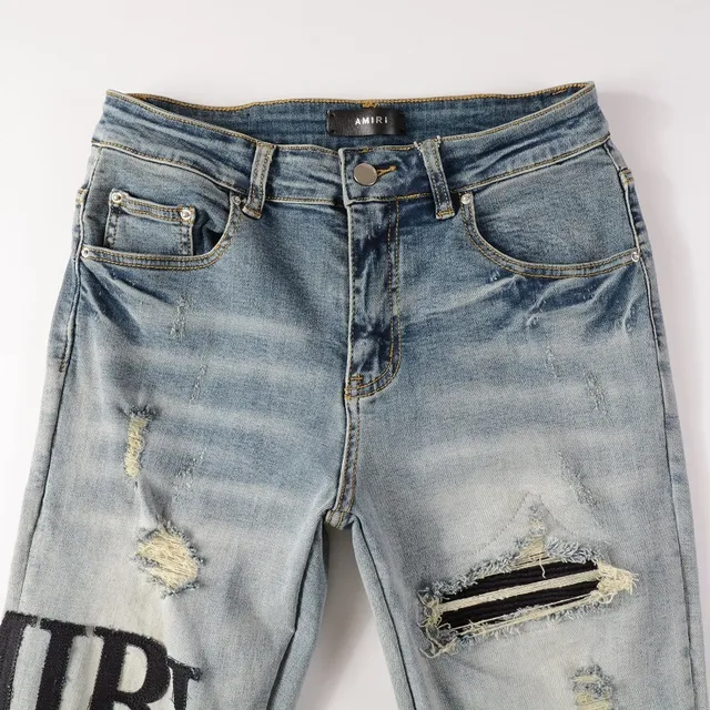 Amiri Logo Distressed Light-Wash Slim-Fit Jeans 6