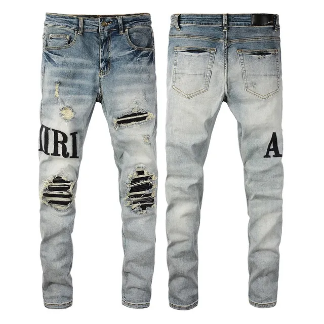 Amiri Logo Distressed Light-Wash Slim-Fit Jeans 7