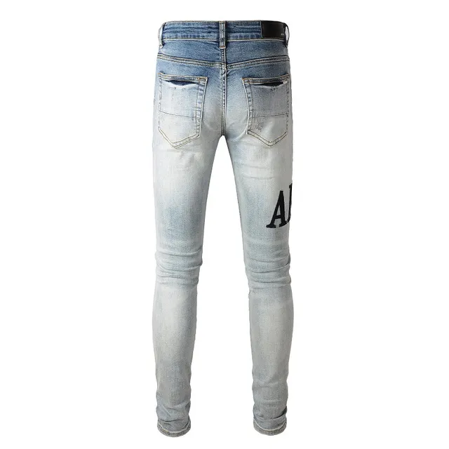 Amiri Logo Distressed Light-Wash Slim-Fit Jeans 10