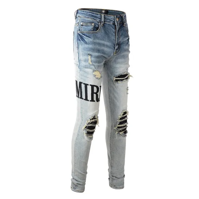 Amiri Logo Distressed Light-Wash Slim-Fit Jeans 11