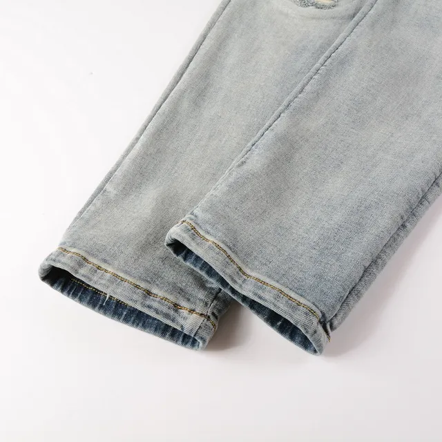 Amiri Logo Distressed Light-Wash Slim-Fit Jeans 14