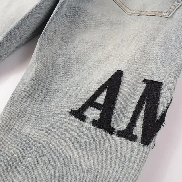 Amiri Logo Distressed Light-Wash Slim-Fit Jeans 16