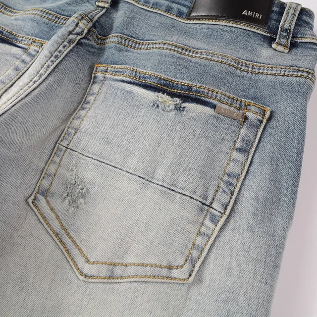 Amiri Logo Distressed Light-Wash Slim-Fit Jeans 17