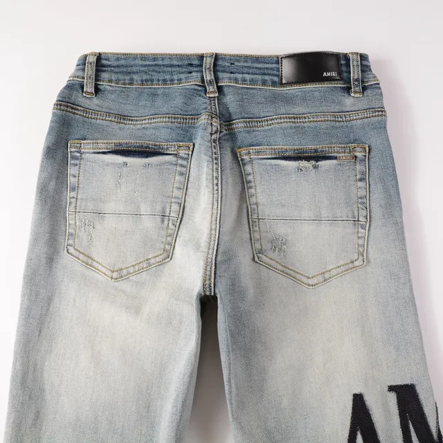 Amiri Logo Distressed Light-Wash Slim-Fit Jeans 18