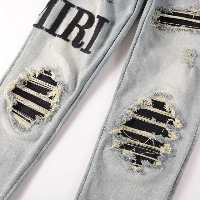 Amiri Logo Distressed Light-Wash Slim-Fit Jeans 20