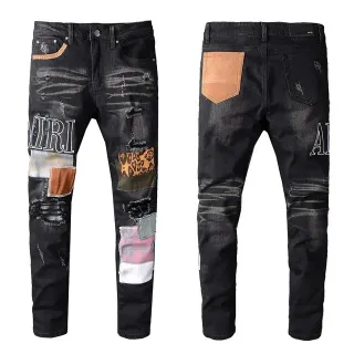 Amiri Patchwork Distressed Logo Jeans Negros