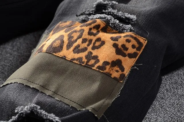 Amiri Patchwork Distressed Logo Jeans Preto 8