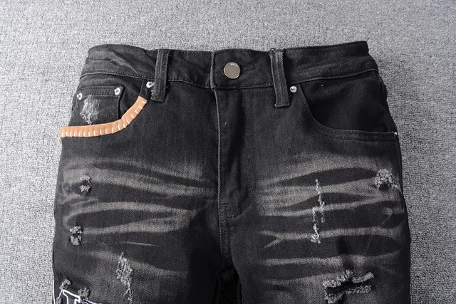 Amiri Patchwork Distressed Logo Jeans Preto 10