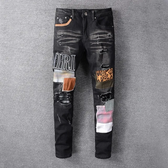 Amiri Patchwork Distressed Logo Jeans Preto 12