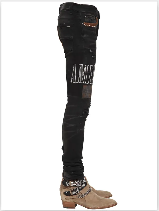 Amiri Patchwork Distressed Logo Jeans Preto 17