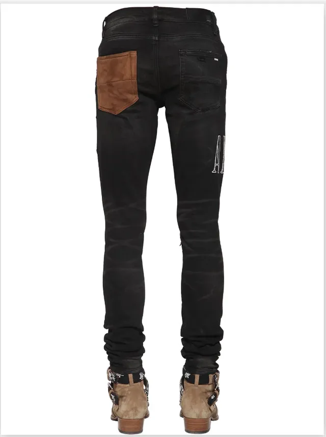 Amiri Patchwork Distressed Logo Jeans Preto 18