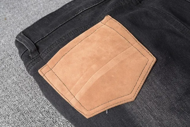 Amiri Patchwork Distressed Logo Jeans Preto 21