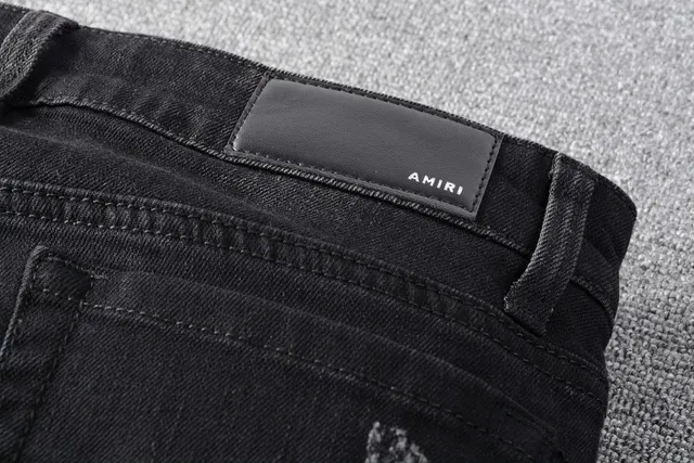Amiri Patchwork Distressed Logo Jeans Preto 22