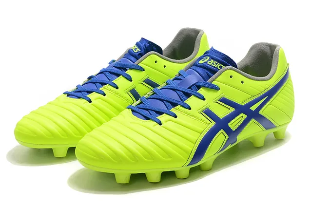 ASICS أبيض ذهبي أحذية كرة قدم منخفضة القطع علوية اصطناعية تغطية خطوط النمر أرض صلبة 18