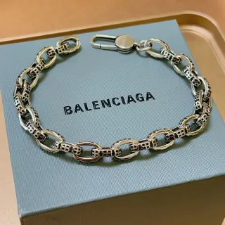 Pulseira Balenciaga de metal de duas cores com elos ovais e recorte geométrico