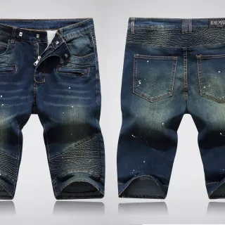 Balmain شورتات الجينز الإنديغو المتشققة برذاذ الطلاء