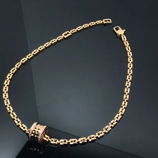 Bvlgari B.zero1 Gold Silver Interlocking Cylindrical Charms Pavé Crystal Bezel Necklace 4