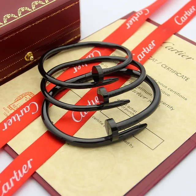 Cartier Juste un Clou bracelet rigide motif tête de clou or noir 4