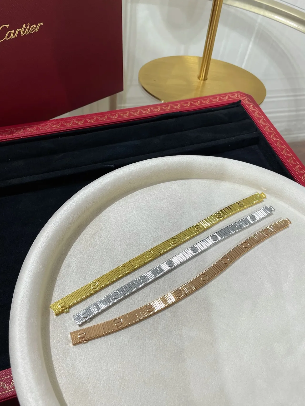 Cartier Juste un Clou pulseira de ouro e prata plana com elos articulados gravados com motivos de C 10