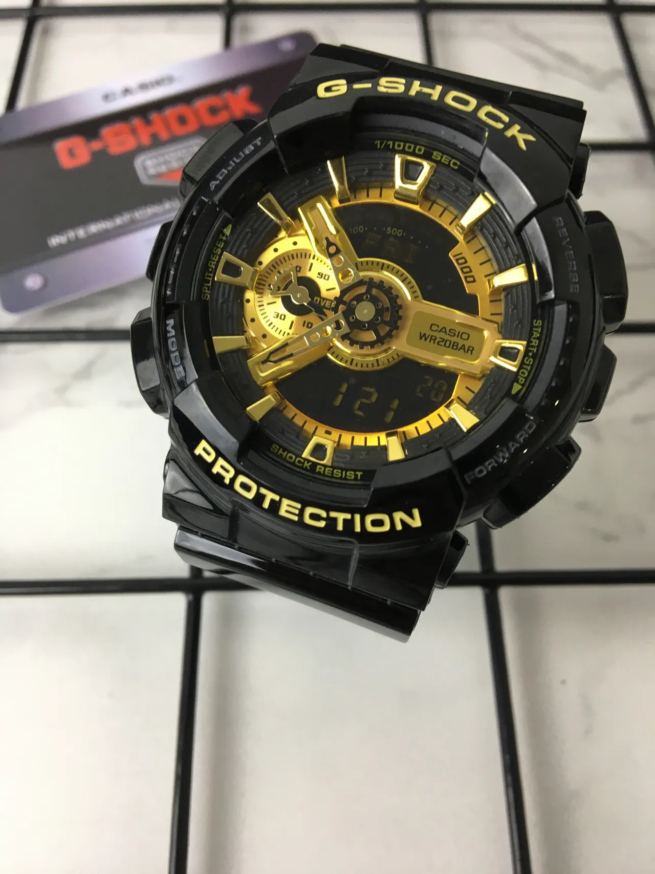 Casio G-Shock GA-100 Black and Gold Sports Watch 2