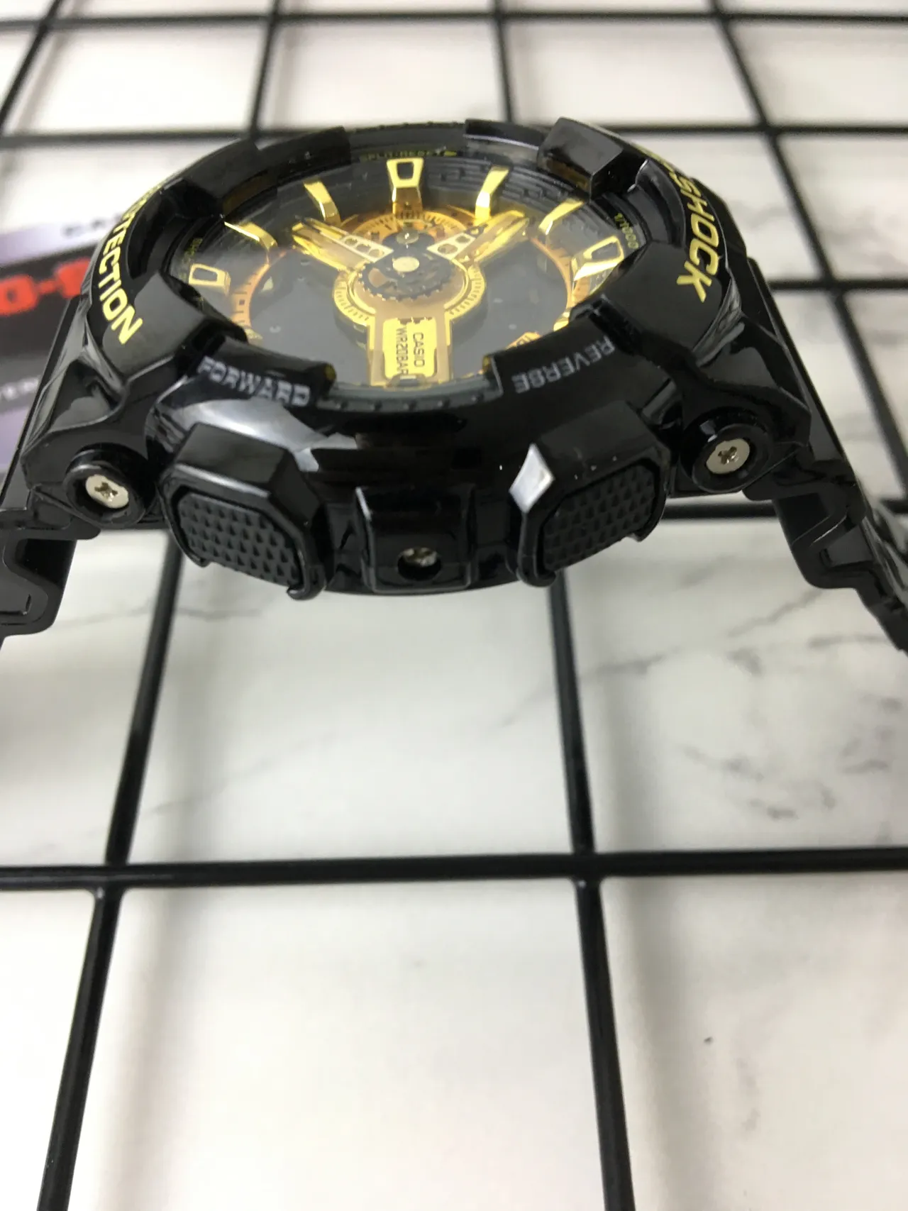 Casio G-Shock GA-100 Black and Gold Sports Watch 4