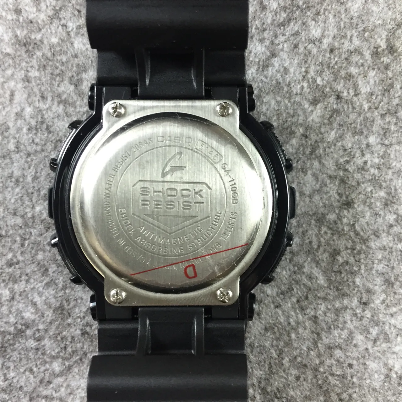 Casio G-Shock GA-100 Black and Gold Sports Watch 9
