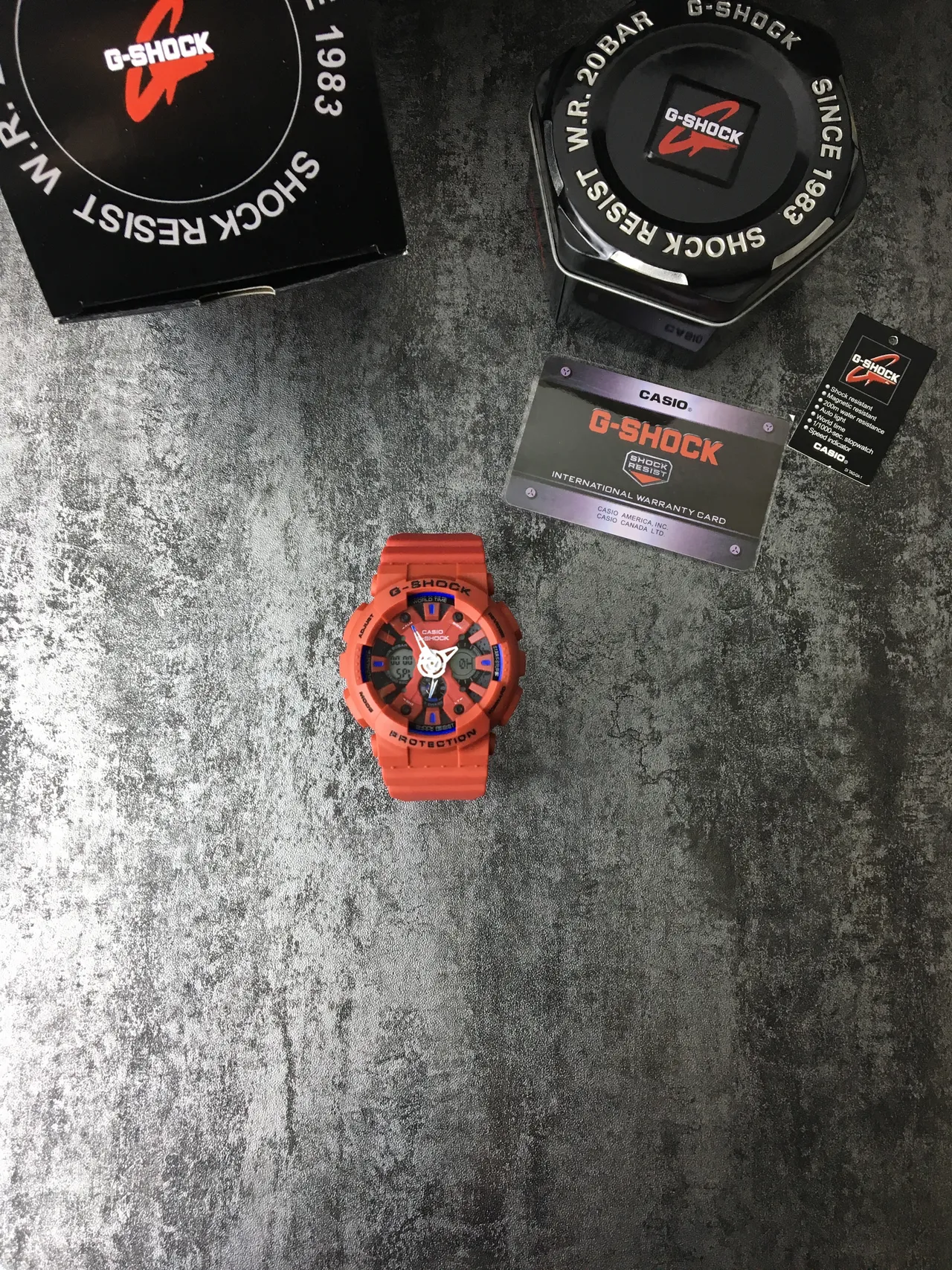 Casio G-Shock GA-100 برتقالي وأزرق ساعة رياضية 2