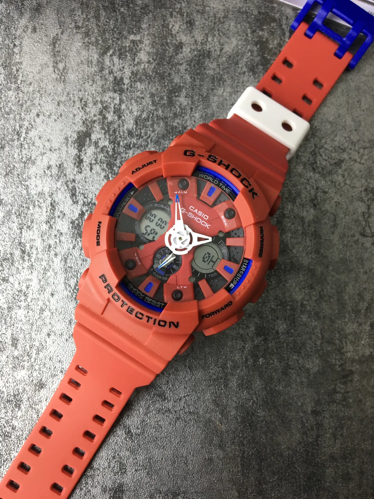 Casio G-Shock GA-100 برتقالي وأزرق ساعة رياضية 5