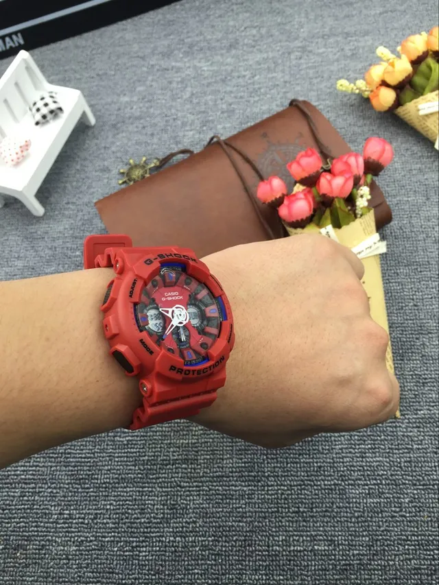 Casio G-Shock GA-100 برتقالي وأزرق ساعة رياضية 8