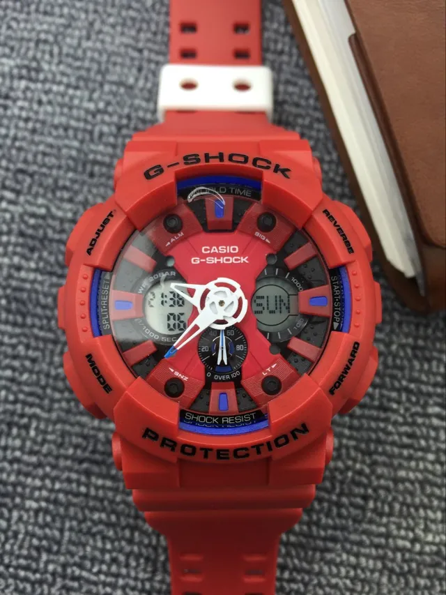 Casio G-Shock GA-100 برتقالي وأزرق ساعة رياضية 10